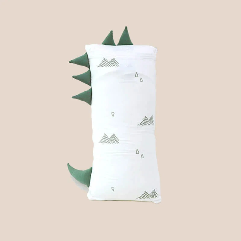 The back of a kids' bamboo pillow with a green dinosaur design in medium by Le Petit Society.