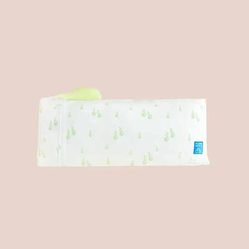 The back of a kids' pillow in medium from Le Petit Society, featuring a print of green pears.