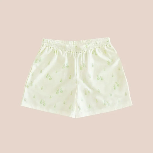 A pair of men's lounge shorts with a print of green pears, from Le Petit Society.