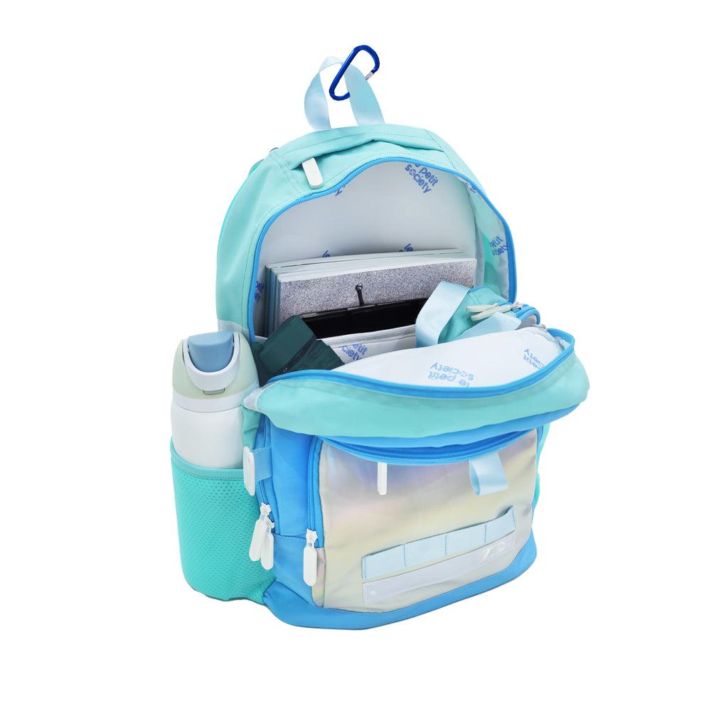 The LPS kids double pocket school bag containing a water bottle, laptop, school books, pencil case and an umbrella.