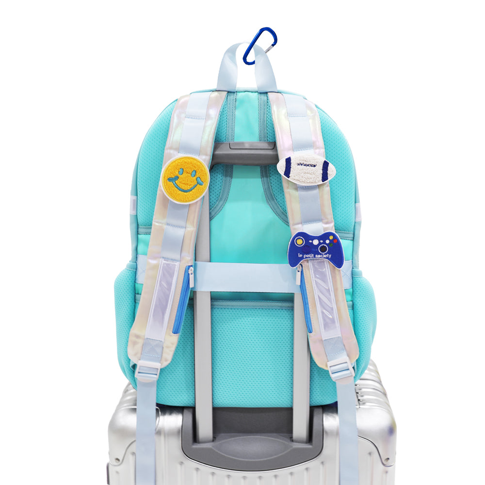 The shoulder straps of the LPS kids double pocket school bag customised with velcro patches.