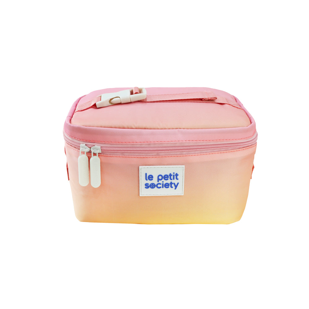 A thermal lunch bag in an ombre pink and yellow colour.