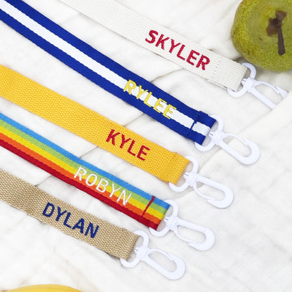 Le Petit Society's personalisable bag straps in various colours and designs.
