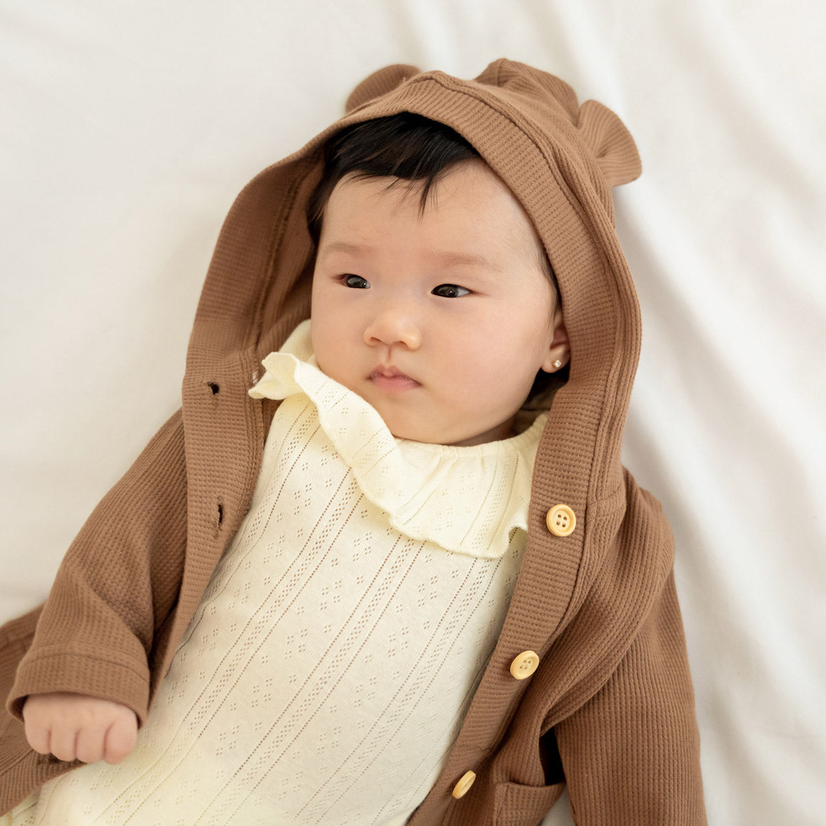 Baby Girl Ruffle Romper in Cream Pointelle Cotton by Le Petit Society — image 6