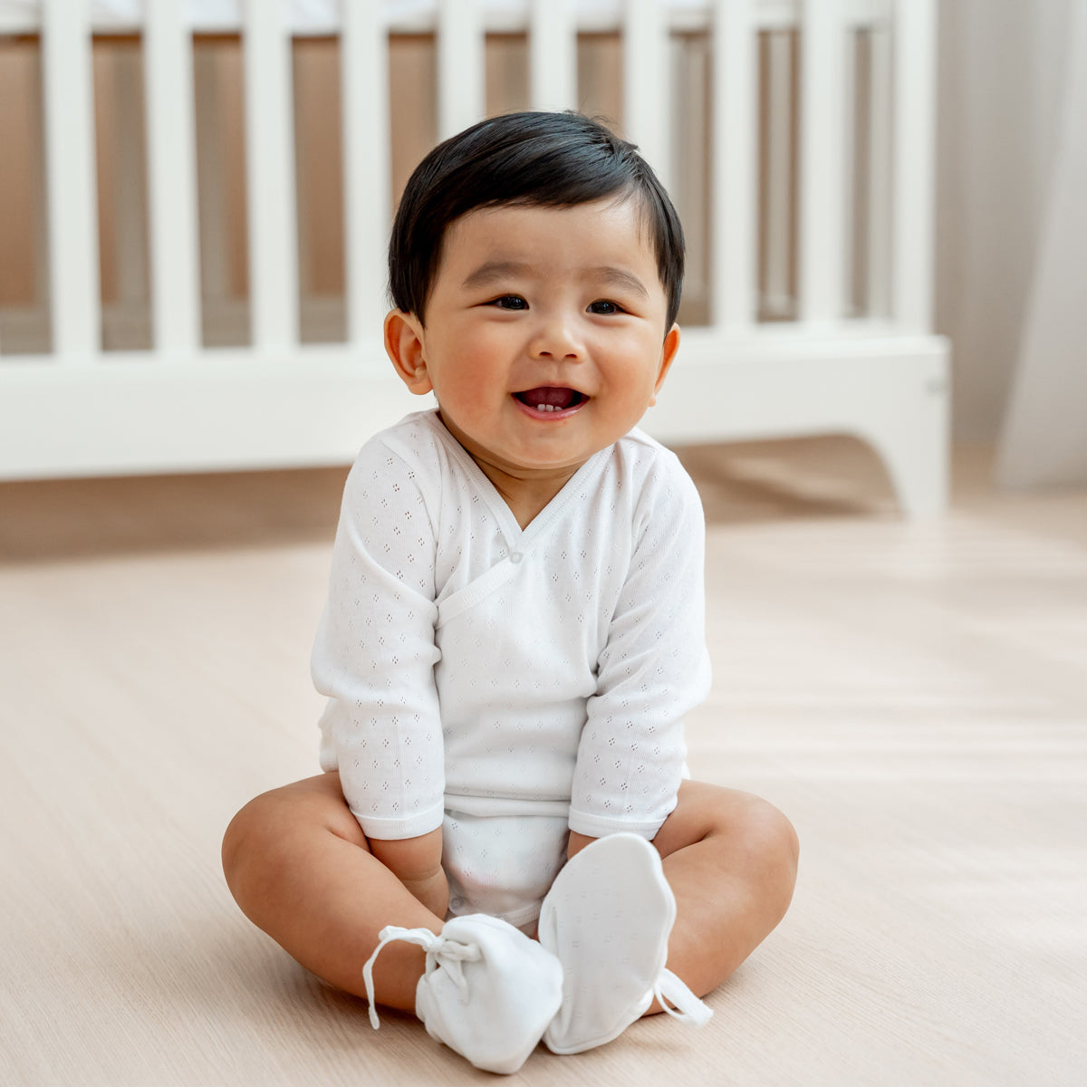 Baby Organic Long Sleeve Kimono Romper in White by Le Petit Society — image 9