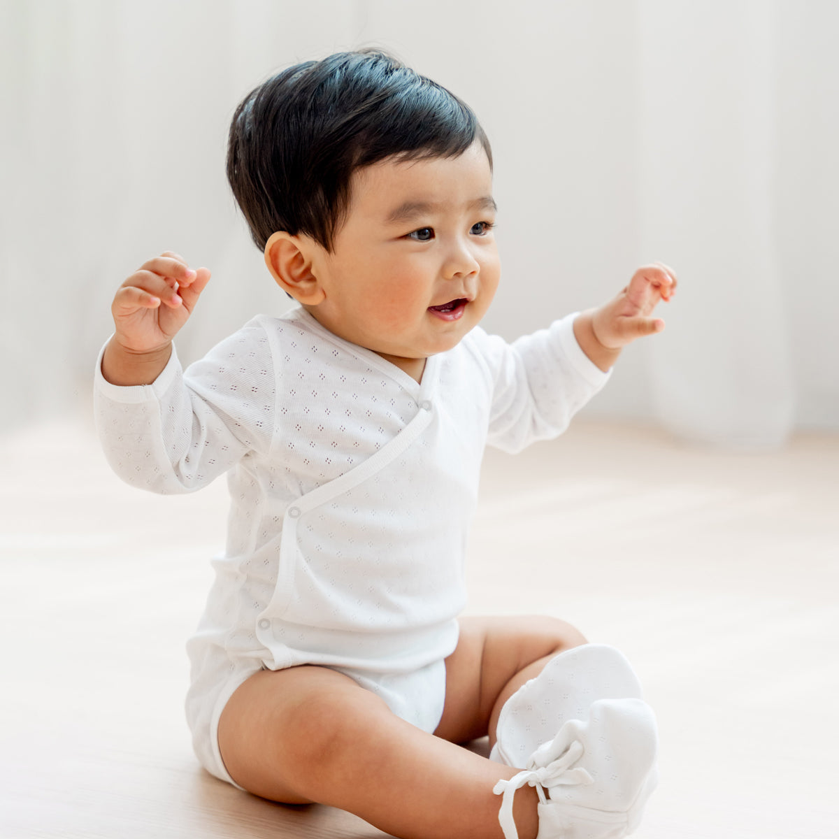 Baby Organic Long Sleeve Kimono Romper in White by Le Petit Society — image 8