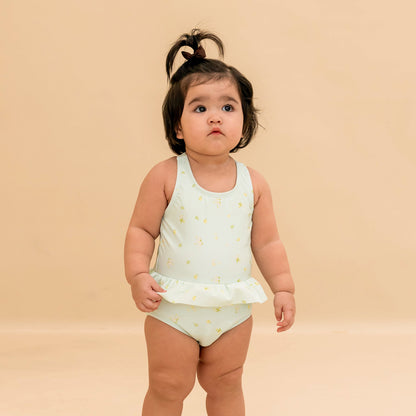 Baby Ruffle Swimsuit in Mint Floral by Le Petit Society — image 4