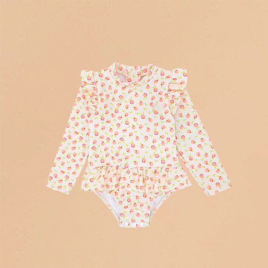 Baby Ruffle Swimsuit in Peach Print by Le Petit Society