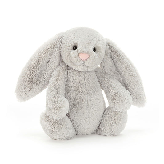 A front view of a soft, plush gray bunny toy with long floppy ears, a pink nose, and black eyes, sitting upright against a white background.