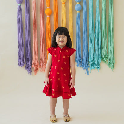 Red lion dance cheongsam for girls by Le Petit Society