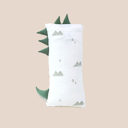 The back of a kids' bamboo pillow with a green dinosaur design in medium by Le Petit Society.