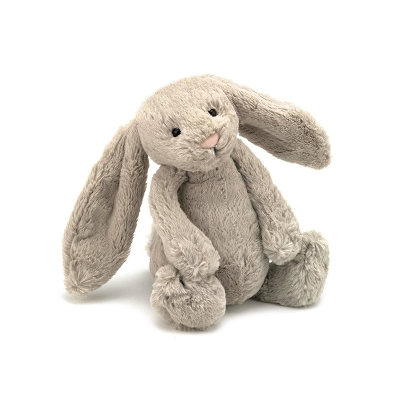 A beige bunny plush toy by Jellycat.