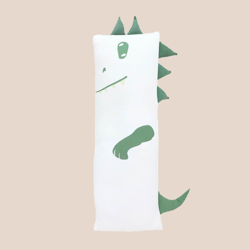 A kids' bamboo pillow with a green dinosaur design in large by Le Petit Society.