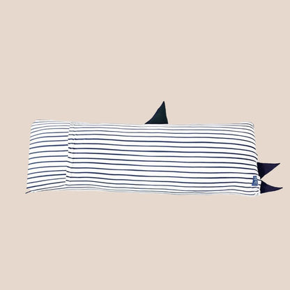 The back of a kids' bamboo pillow with a navy shark design in large by Le Petit Society.