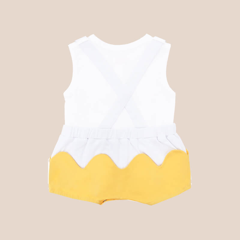 An animal-themed baby romper by Le Petit Society, featuring a duck's face at the front, complete with bright yellow bottoms and white cross back straps over a white base.
