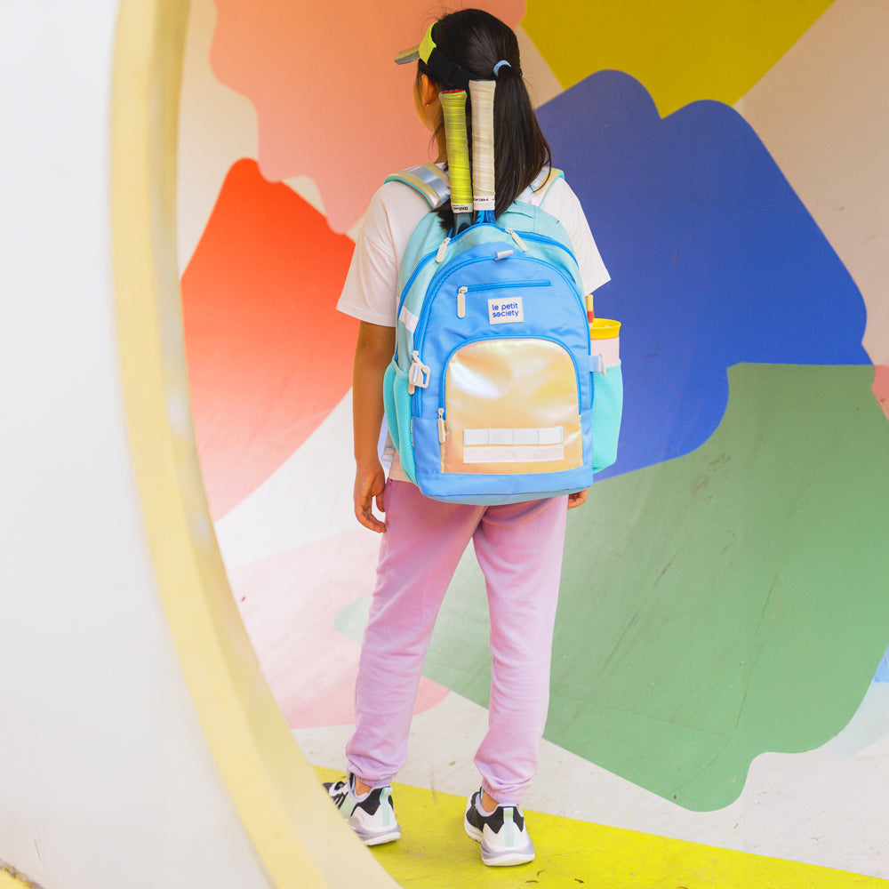 A primary school girl with the LPS kids double pocket school bag.