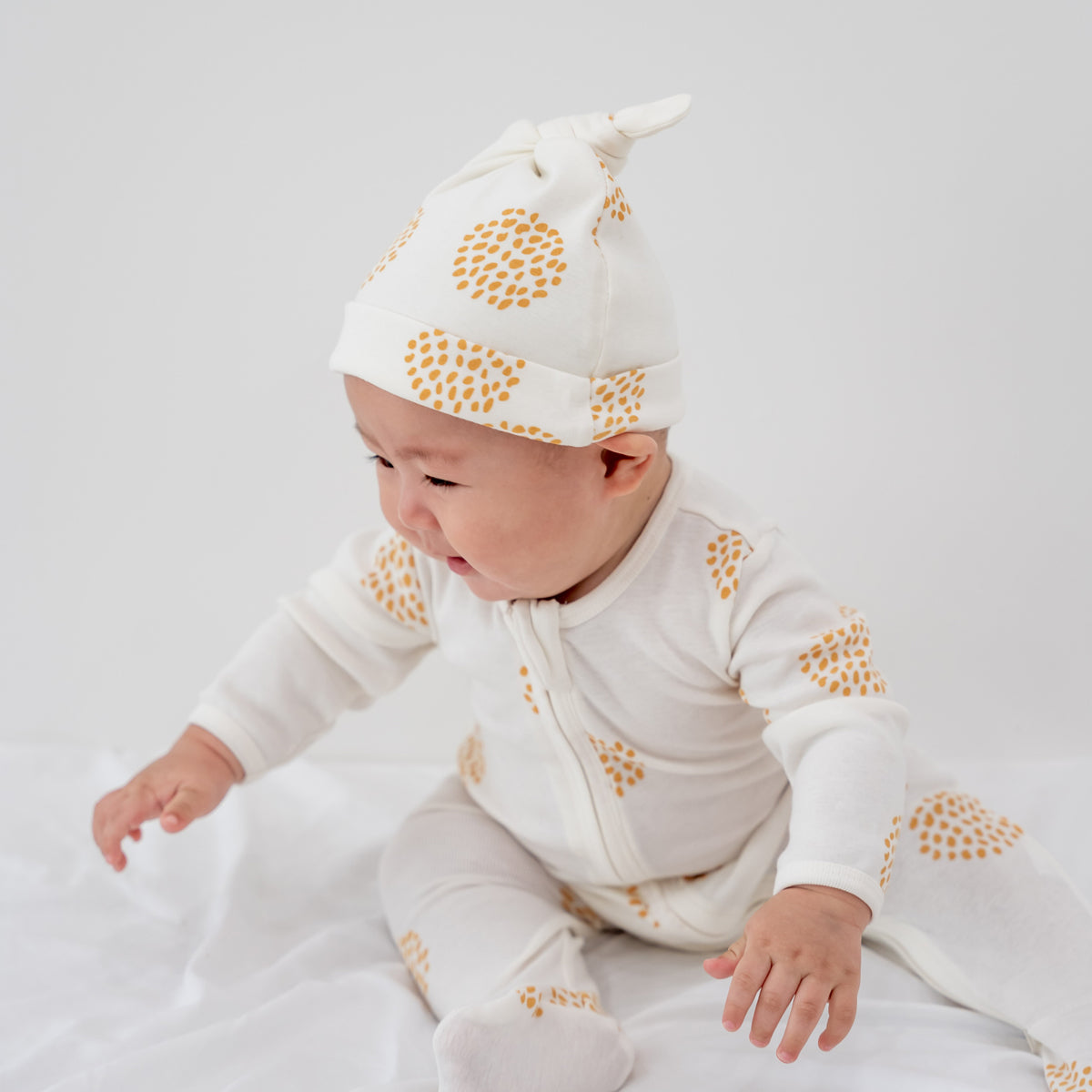 Baby Organic Knotted Hat in Dandelion Print by Le Petit Society — image 4
