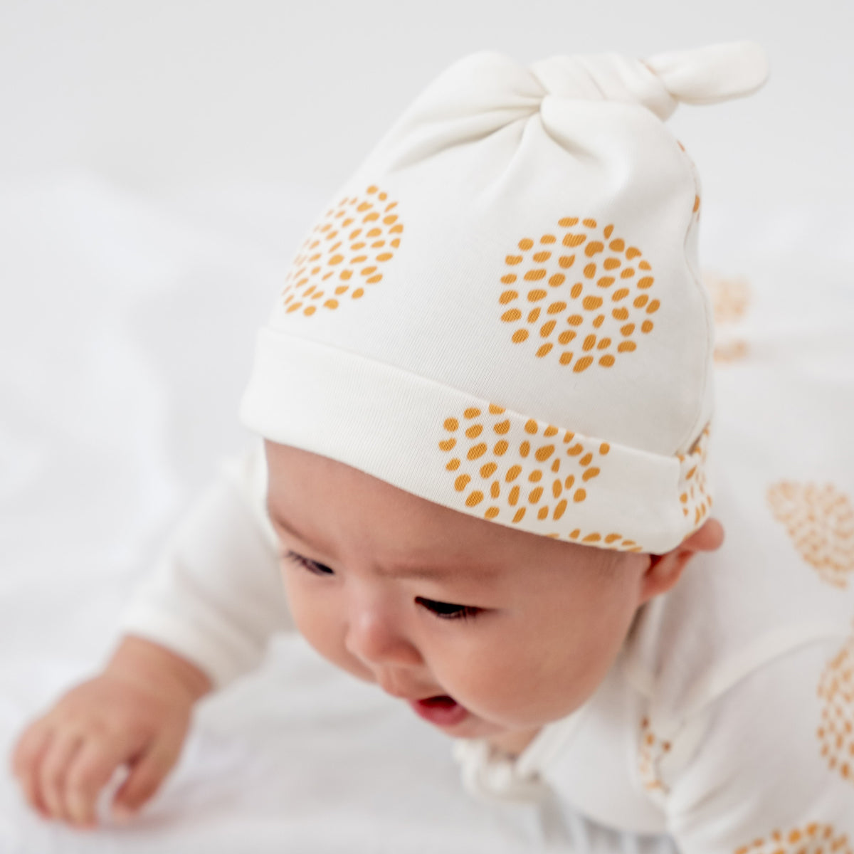 Baby Organic Knotted Hat in Dandelion Print by Le Petit Society — image 5