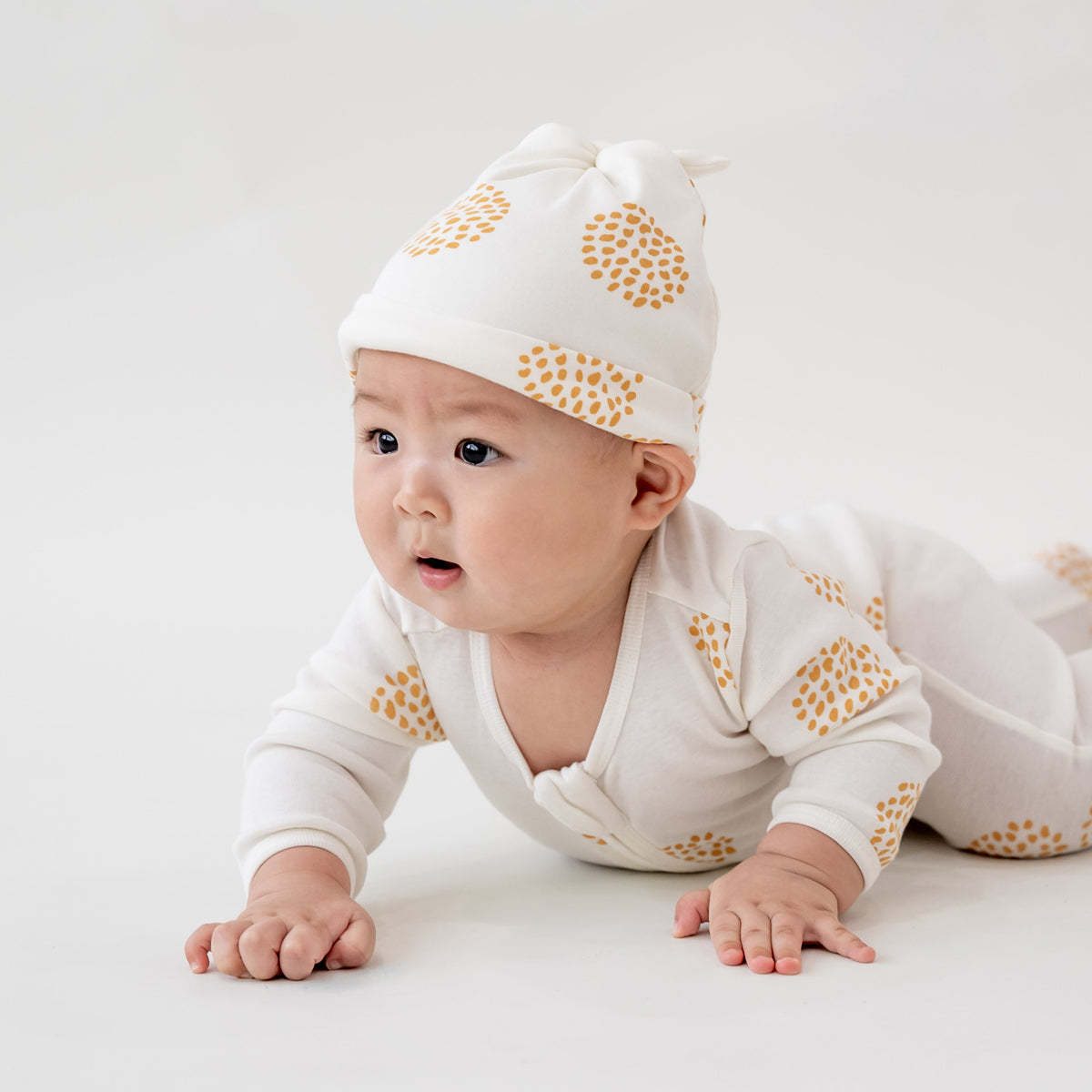 Baby Organic Knotted Hat in Dandelion Print by Le Petit Society — image 8