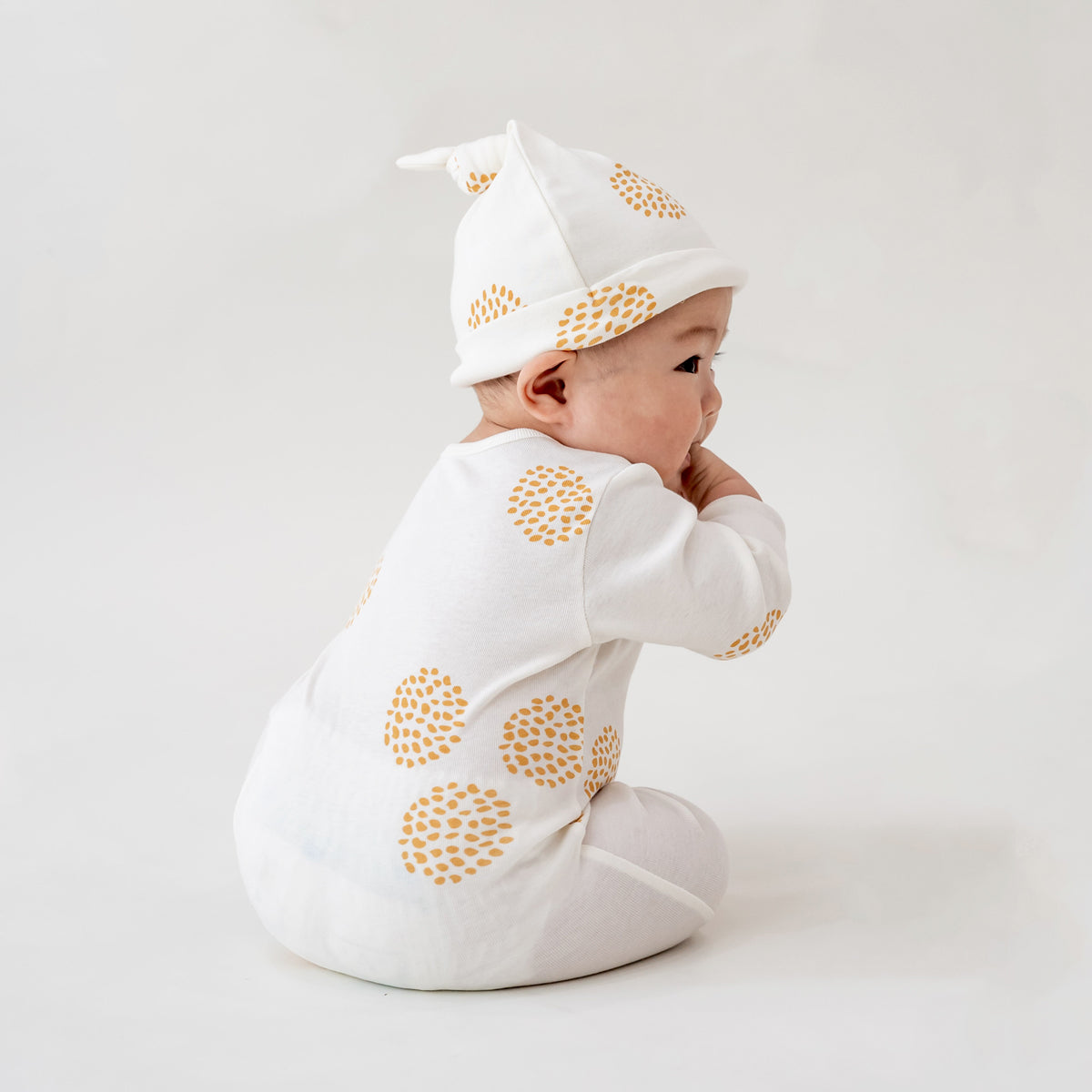 Baby Organic Zip Sleepsuit in Dandelion Print by Le Petit Society — image 17