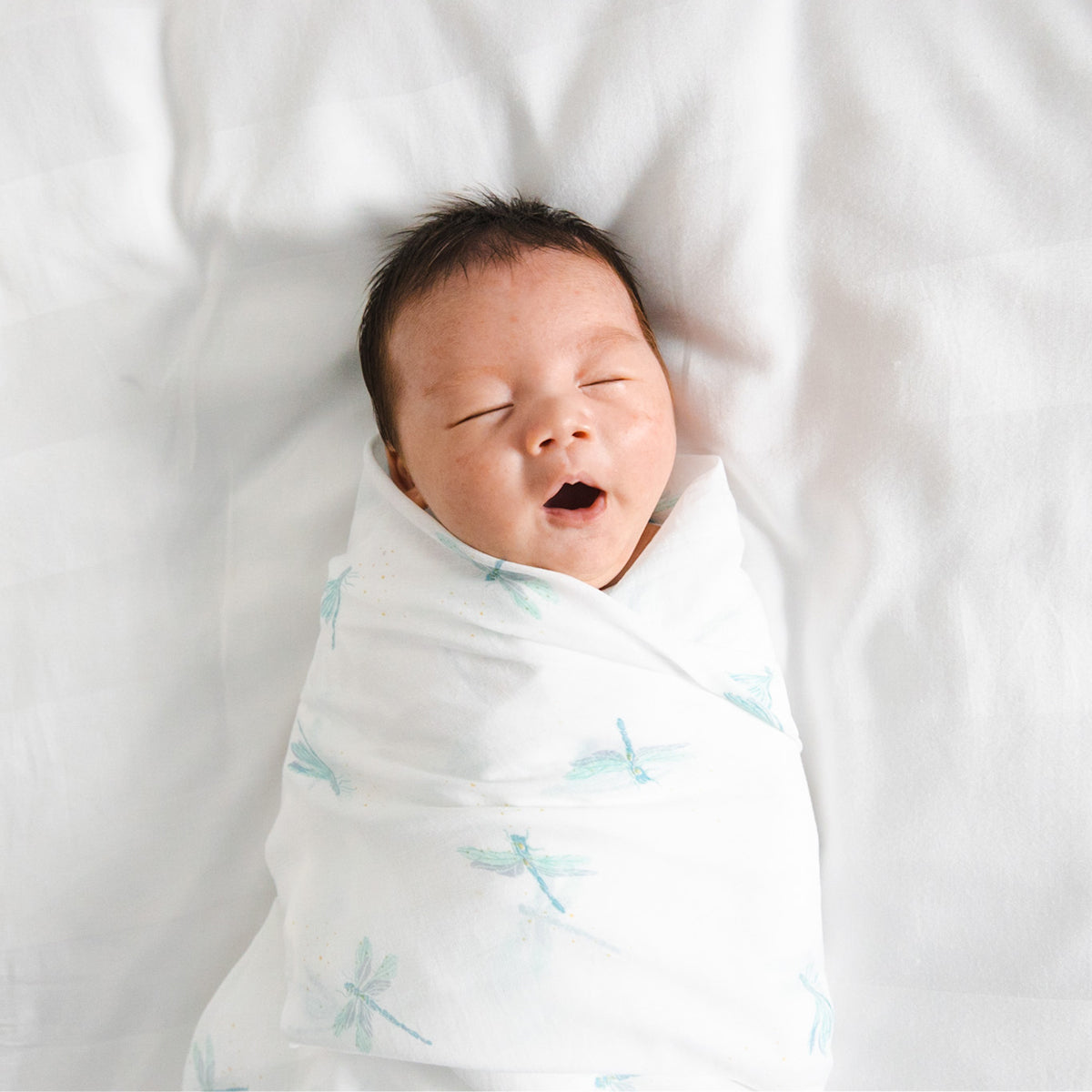 Baby Organic Swaddle in Dragonfly Print by Le Petit Society — image 2