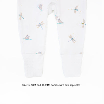 An infographic showing the anti-slip soles of the sizes 12-18M and 18-24M of Le Petit Society's organic zip sleepsuit in dragonfly print.