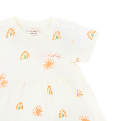 Baby Girl Organic Dress in Sun & Rainbow Print by Le Petit Society — image 2