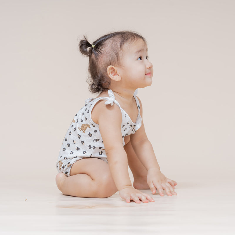 Baby Girl Romper in Leopard Print by Le Petit Society — image 6