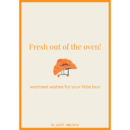 Le Petit Society e-gift card with a croissant print and the text 'fresh out of the oven'