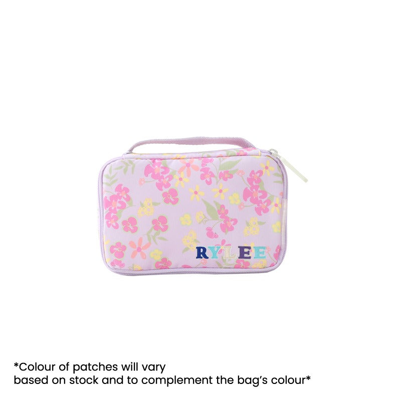 Le Petit Society's Explorer Pouch and Pencil Case in purple, with a floral print and personalised name patches.