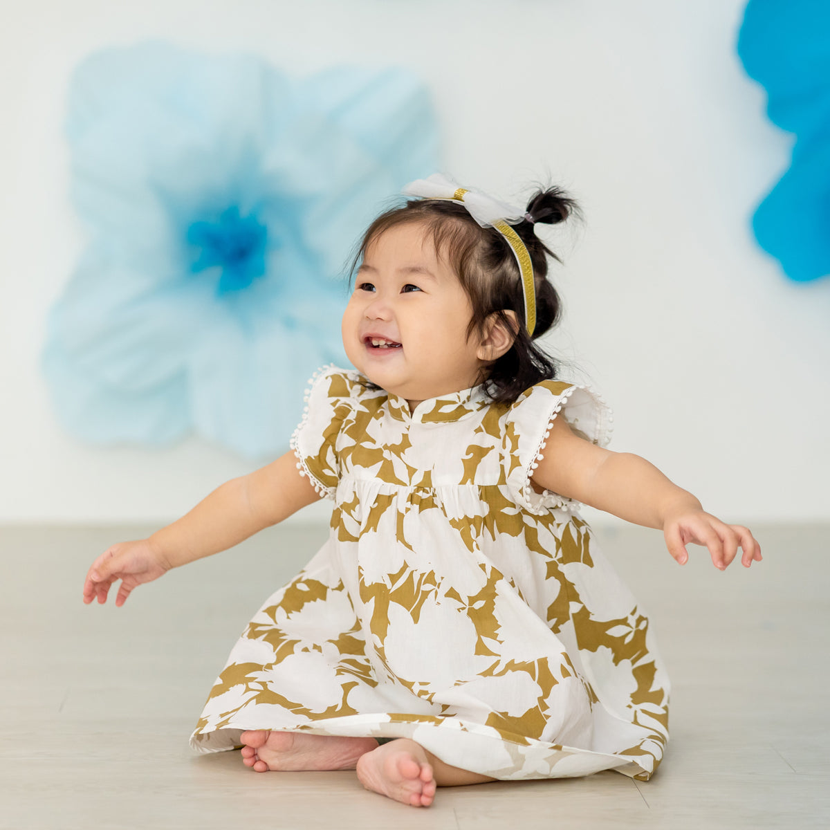 Garden Series - Baby Girl Flutter Dress in Ochre Floral by Le Petit Society — image 6