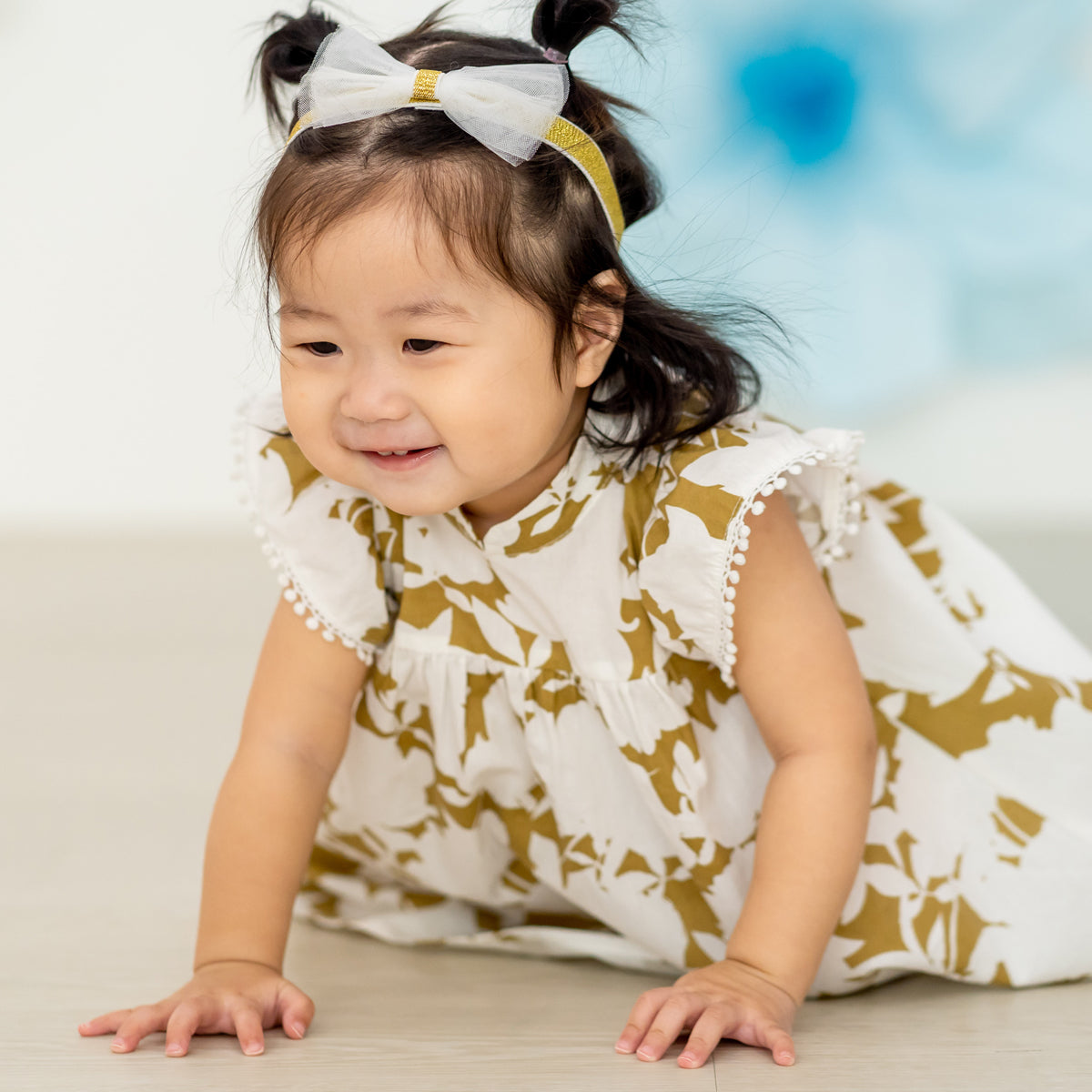 Garden Series - Baby Girl Flutter Dress in Ochre Floral by Le Petit Society — image 3
