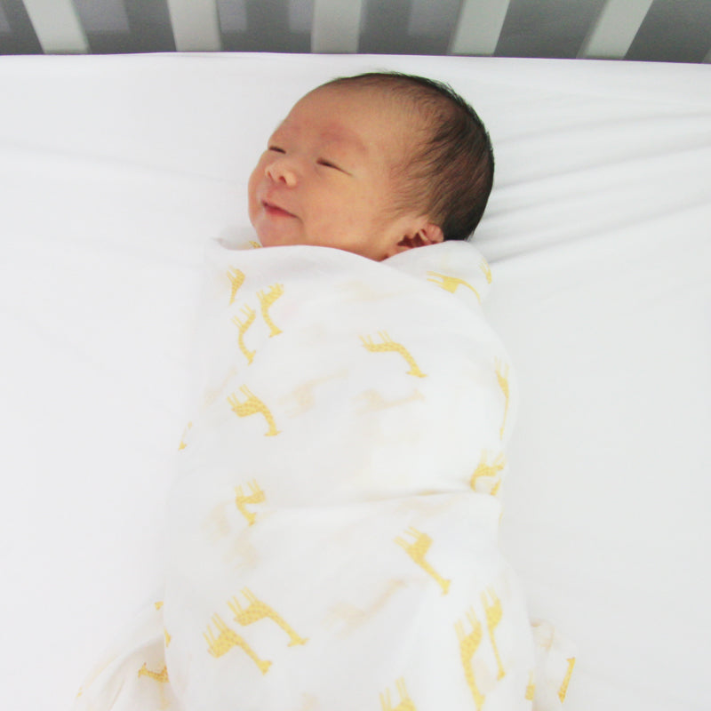 Baby Organic Swaddle in Giraffe by Le Petit Society — image 3