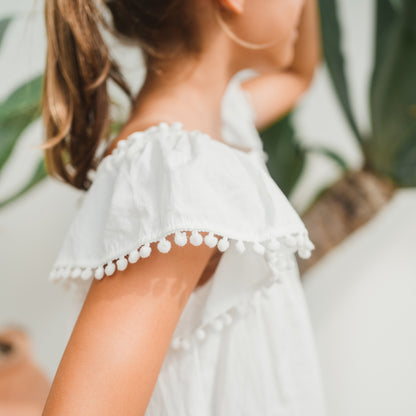 Resort Series - Girls Flutter Sleeves Baby Doll Top in White by Le Petit Society — image 2