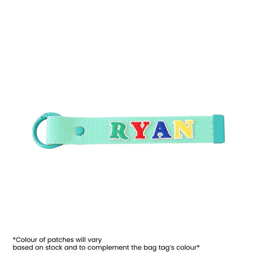 Le Petit Society's customisable bag tag with name patches.