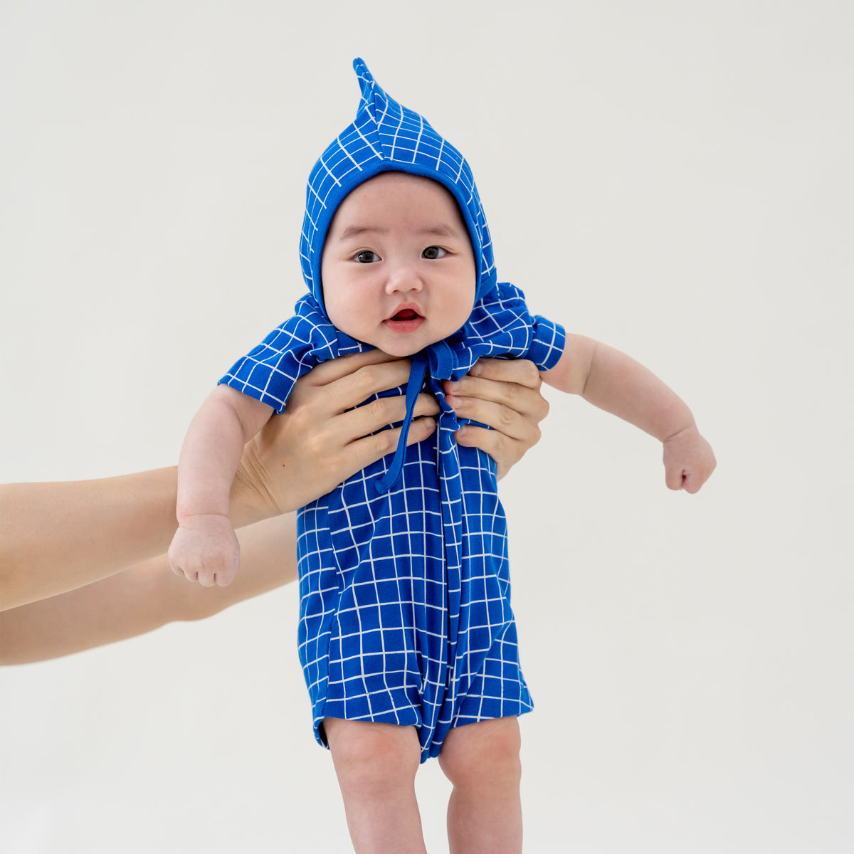 Baby Organic Short Sleeve Romper in Grid Print by Le Petit Society — image 2