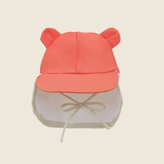 Baby Bear Sunhat front view with rounded bear ears, coral visor, cream neck flap and adjustable chin tie