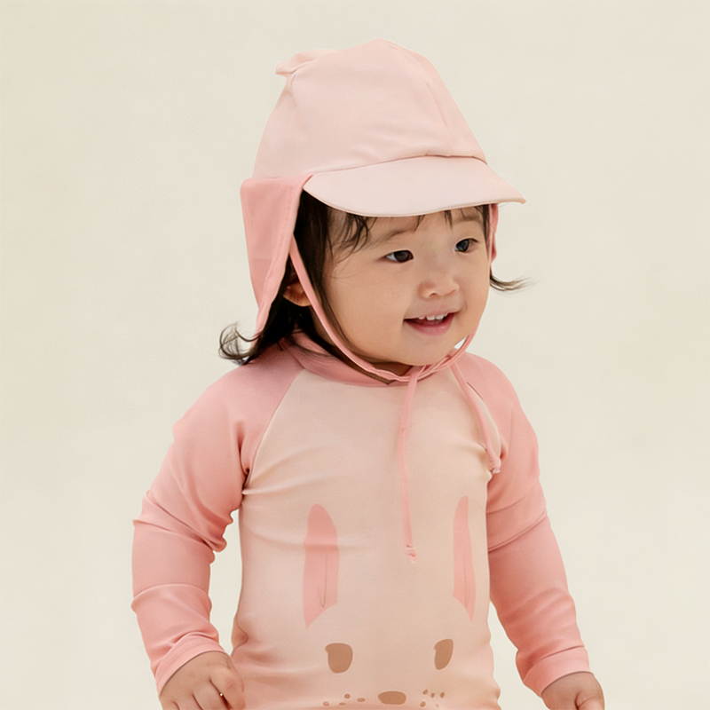 Le Petit Society Baby Bunny Swimsuit Front in Pink model shot