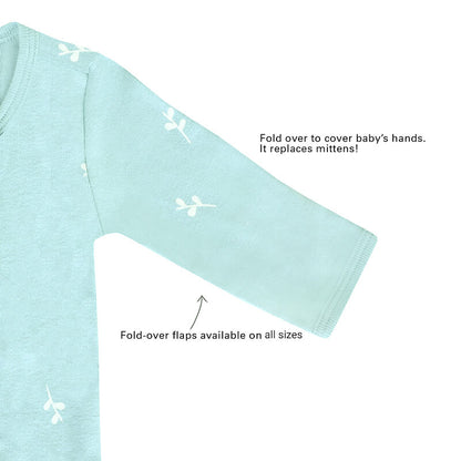 An infographic demonstrating the two-way zipper of a mint blue baby zip sleepsuit, and its function of providing an easy access to outfit and diaper changes.