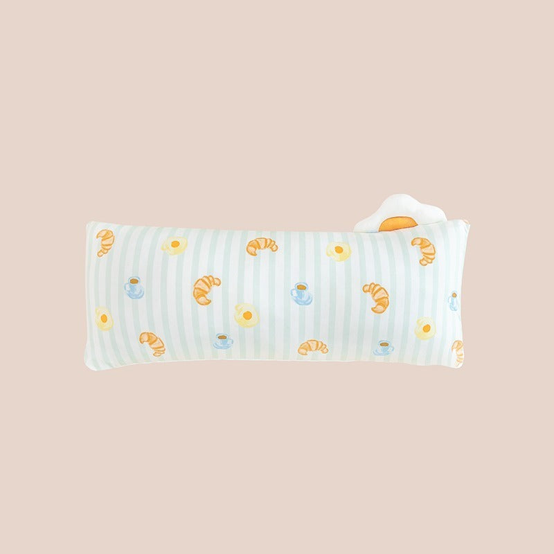 A kids' pillow in size medium with a print of breakfast food, from Le Petit Society.