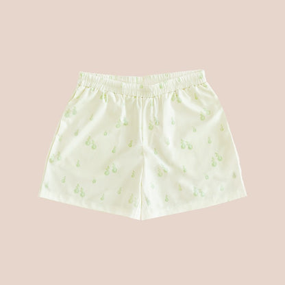 A pair of men's lounge shorts with a print of green pears, from Le Petit Society.