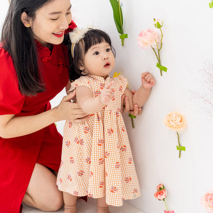 Lion Dance Series - Baby Girl Jersey Dress in Orange Grid Print (Personalisable) by Le Petit Society