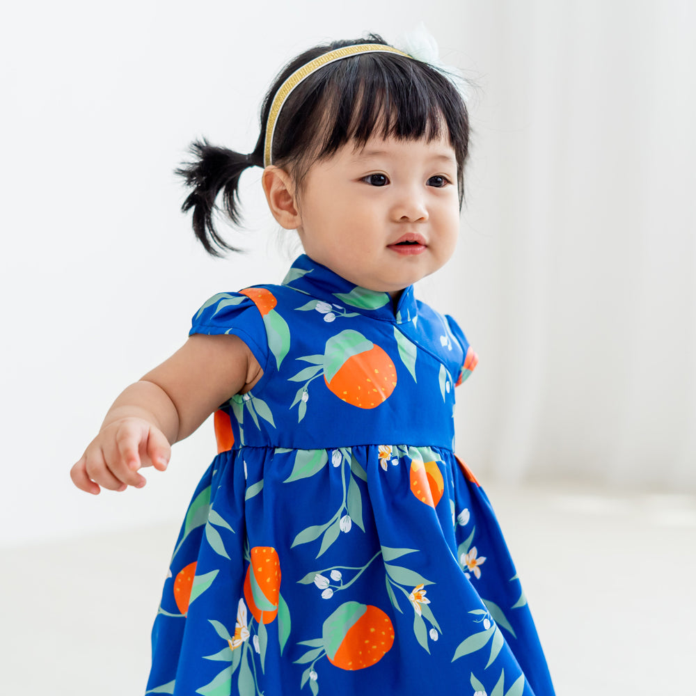 Mandarin Orange Series - Baby Girl Dress in Blue Floral Orange Print by Le Petit Society
