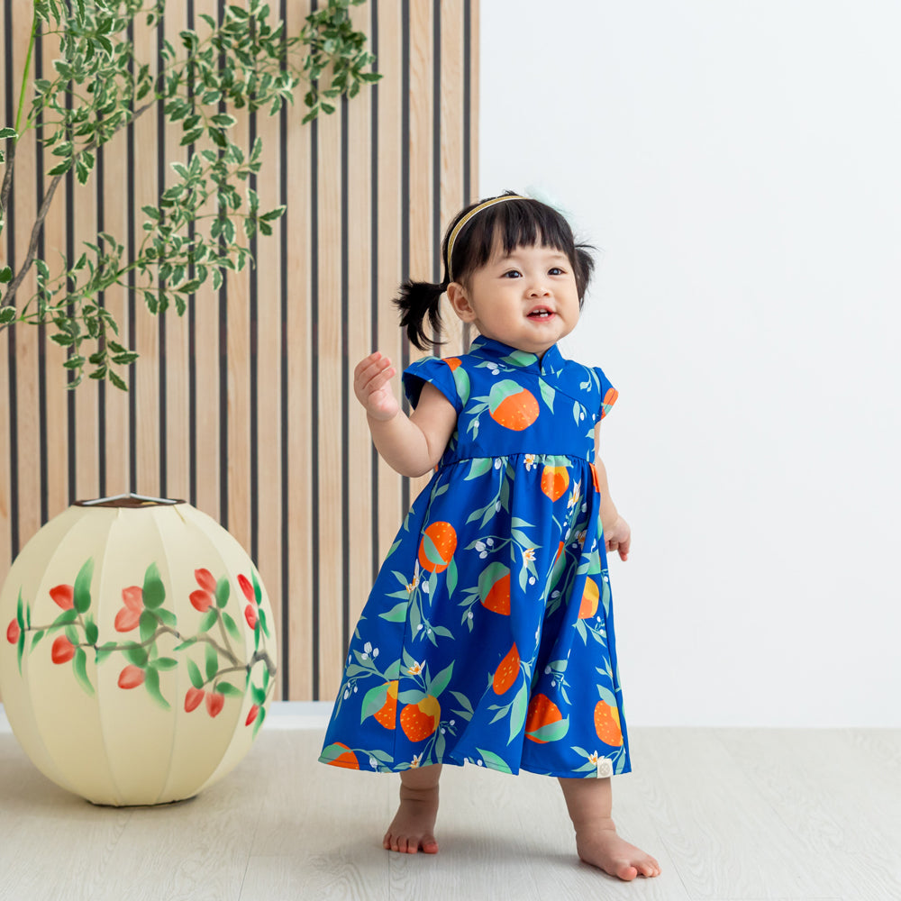 Mandarin Orange Series - Baby Girl Dress in Blue Floral Orange Print by Le Petit Society — image 3
