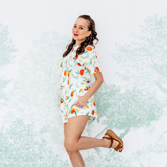 Mandarin Orange Series - Ladies High Waist Shorts in White Floral Orange Print by Le Petit Society