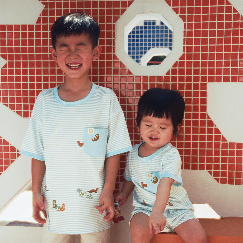 A Singapore Series - Otters Baby Romper in Blue by Le Petit Society — image 2