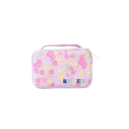 A purple pencil case with a pink and yellow floral print and personalised name patches.