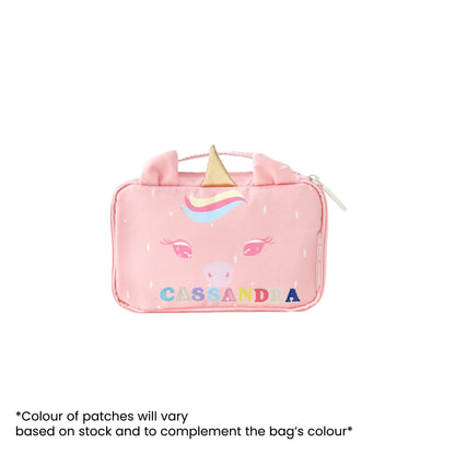 The Explorer Pencil Case in a pink unicorn design, personalised with name patches.