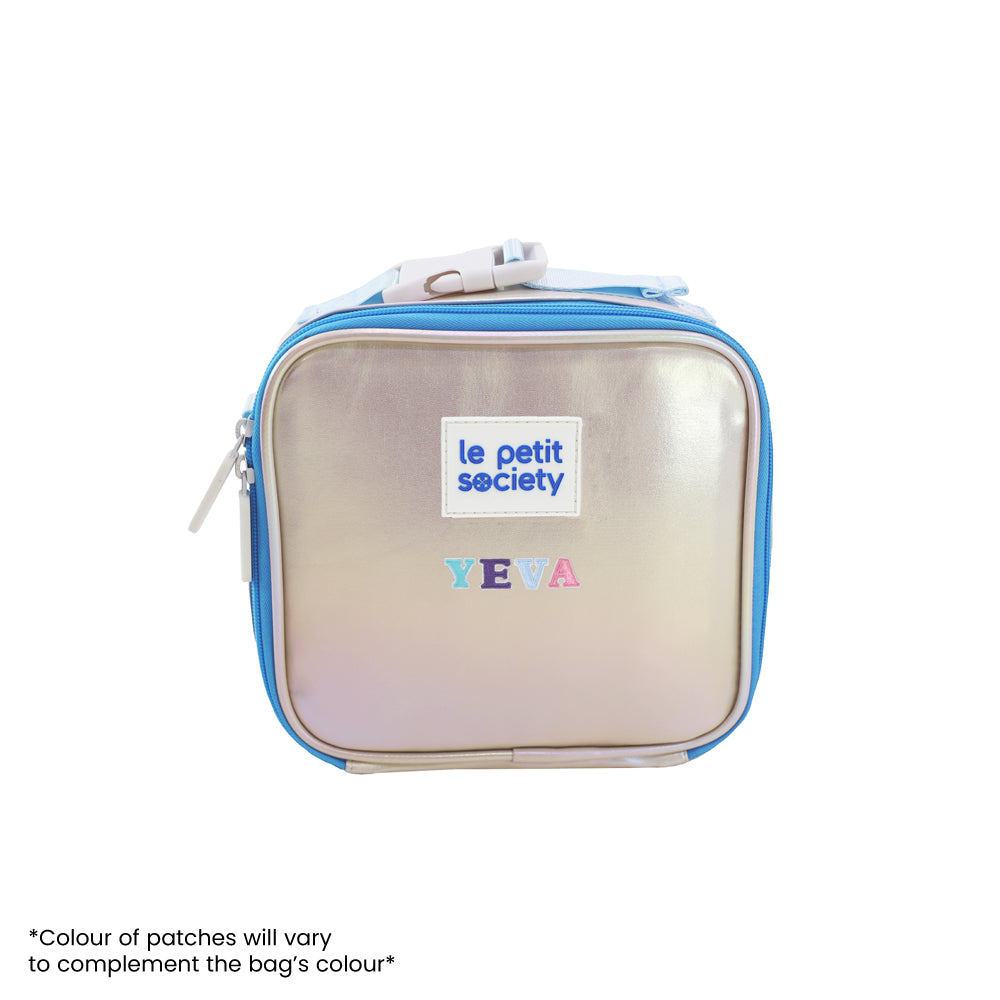An iridescent blue and silver thermal lunch bag personalised with name patches.