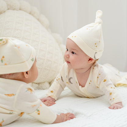 Baby Organic Knotted Hat in Moon & Stars Print by Le Petit Society — image 2